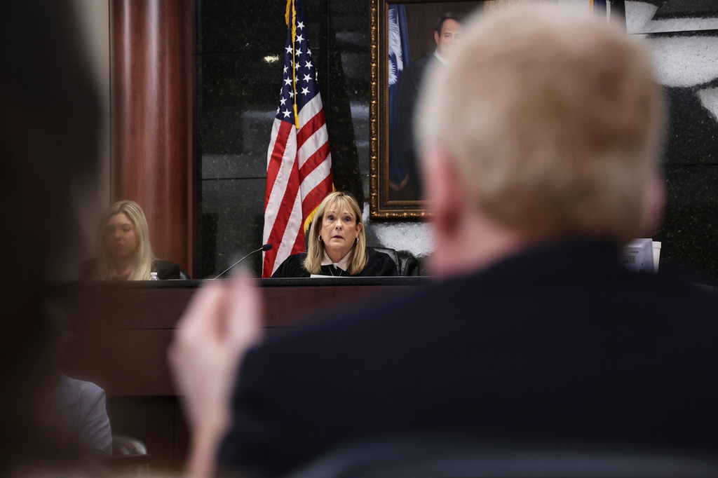 Judge Debra McCaslin listens to testimony as Alex Murdaugh, right, watches during a hearing Friday, Aug. 14, 2026, at the Marc H. Westbrook Judicial Center in Lexington, S.C. (Tracy Glantz/Pool Photo via AP)