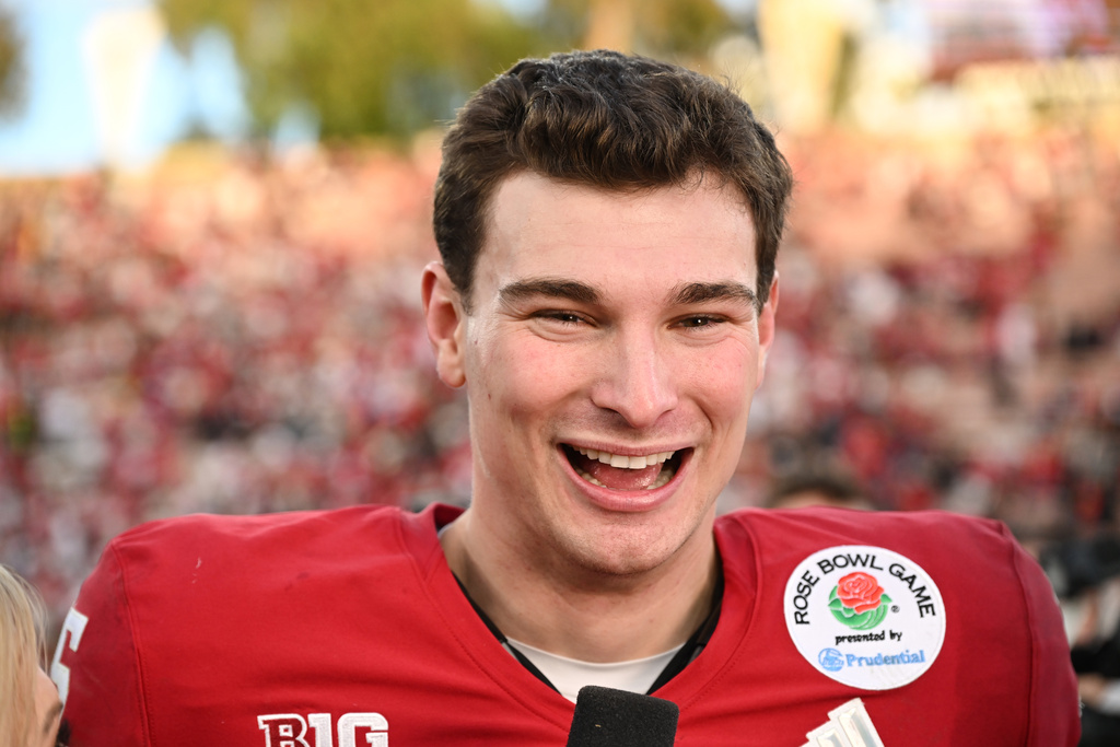 Indiana quarterback Fernando Mendoza (15) smiles after a win over Alabama in the Rose Bowl College Football Playoff quarterfinal game Thursday, Jan. 1, 2026, in Pasadena, Calif. (AP Photo/Kyusung Gong)