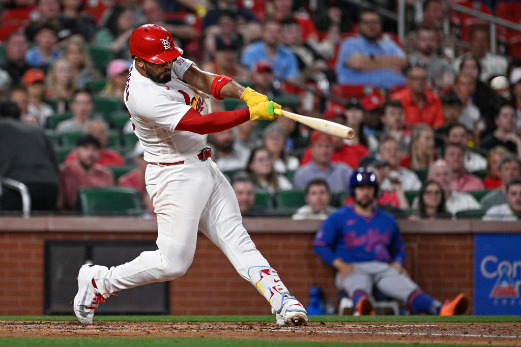 St. Louis Cardinals' Ivan Herrera hits a two run double in the third inning of a baseball game against the New York Mets, Tuesday, March 31, 2026, in St. Louis. (AP Photo/Joe Puetz)
