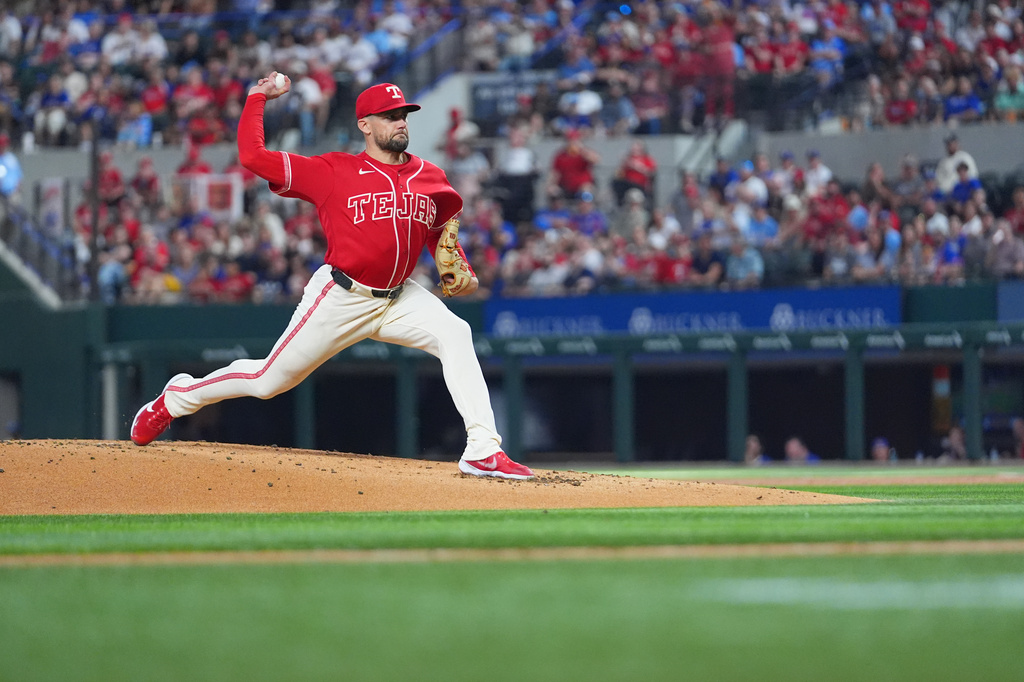 Texas Rangers starting pitcher Nathan Eovaldi throws to the Athletics during the first inning of a baseball game Friday, April 24, 2026, in Arlington, Texas. (AP Photo/Julio Cortez)