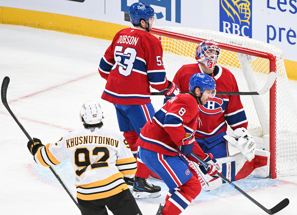 Montreal Canadiens goaltender Sam Montembeault (35) and teammates Noah Dobson (53) and Mike Matheson (8) react after a goal by Boston Bruins' Marat Khusnutdinov (92) during the first period of an NHL hockey game in Montreal, Saturday, Nov. 15, 2025. (Graham Hughes/The Canadian Press via AP)