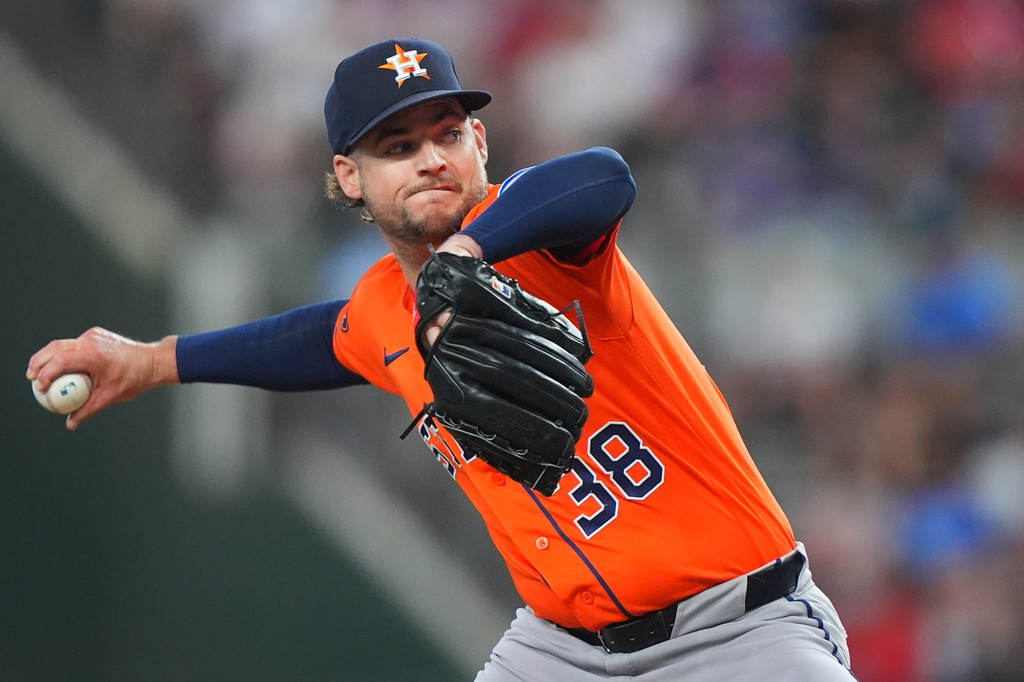 Houston Astros starting pitcher Peter Lambert throws during the first inning of a baseball game against the Texas Rangers, Saturday, July 11, 2026, in Arlington, Texas. (AP Photo/LM Otero)