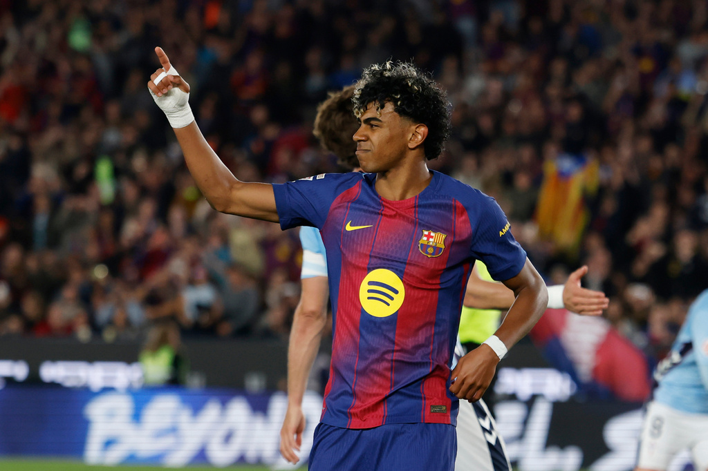 Barcelona's Lamine Yamal celebrates after scoring the opening goal during the Spanish La Liga soccer match between Barcelona and Celta Vigo in Barcelona, Spain, Wednesday, April 22, 2026. (AP Photo/Joan Monfort)