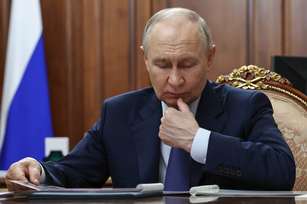 Russian President Vladimir Putin listens to Khabarovsk Territory Governor Dmitry Demeshin at the Kremlin in Moscow, Wednesday, Sept. 16, 2026. (Vyacheslav Prokofyev/Sputnik, Kremlin Pool Photo via AP)