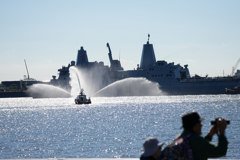 USS Arlington passes the viewing stand during the 250th anniversary of the founding of the U.S. Navy and Marine Corps, along the Delaware River, Thursday, Oct. 9, 2025, in Philadelphia. (AP Photo/Matt Rourke)