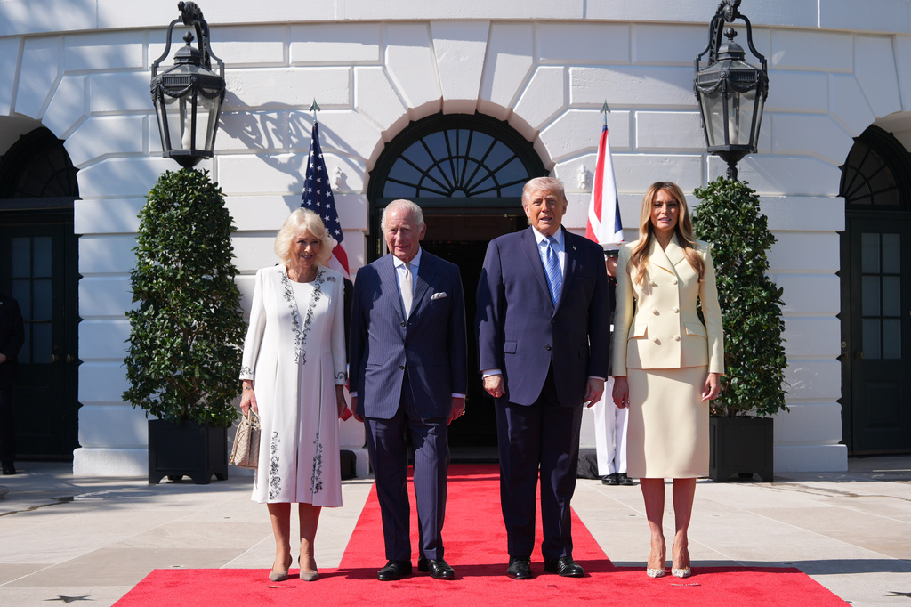 President Donald Trump and first lady Melania Trump greet Britain's King Charles III and Queen Camilla as they arrive at the White House, Monday, April 27, 2026, in Washington. (AP Photo/Alex Brandon)