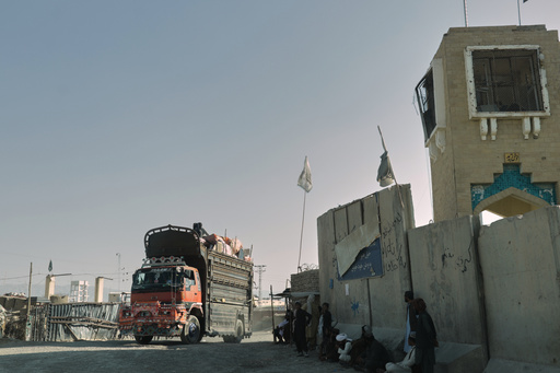 People wait near the closed gate at the Spin Boldak border crossing with Pakistan, after the border was shut for nearly two weeks following clashes between Afghan and Pakistani forces, in Kandahar province, Afghanistan, Thursday, Oct. 23, 2025. (AP Photo/Sibghatullah) People wait near the closed gate at the Spin Boldak border crossing with Pakistan, after the border was shut for nearly two weeks following clashes between Afghan and Pakistani forces, in Kandahar province, Afghanistan, Thursday, Oct. 23, 2025. (AP Photo/Sibghatullah)
