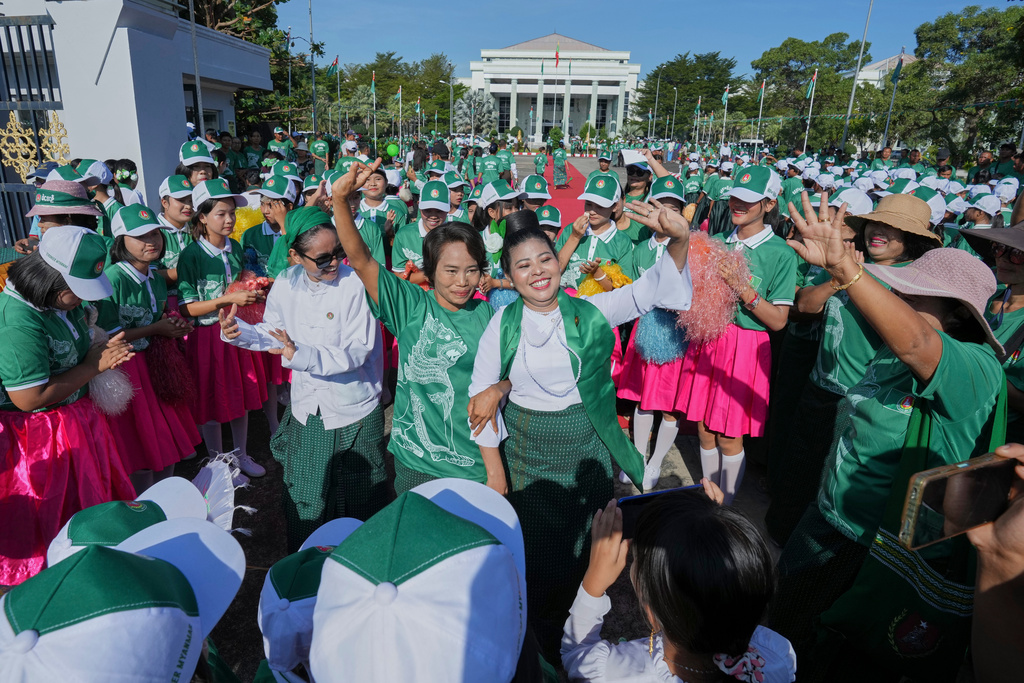 FILE - Supporters of Myanmar's military backed Union Solidarity and Development Party (USDP), dance on the first day of campaign for the upcoming general election, in Naypyitaw, Myanmar, Tuesday, Oct. 28, 2025.(AP Photo/Aung Shine Oo, File)