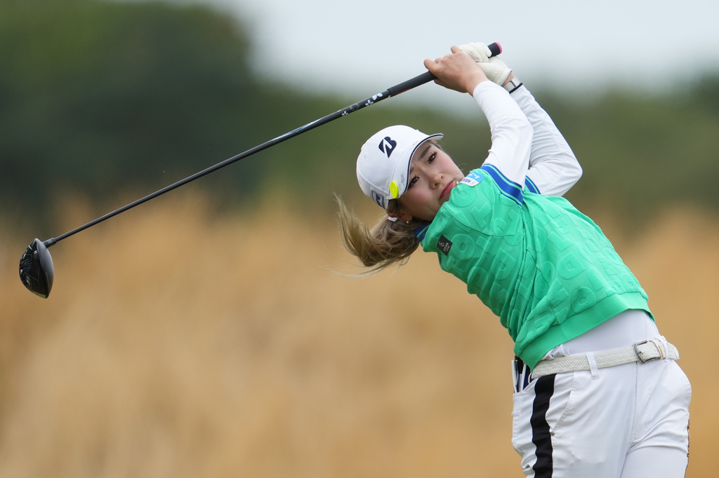 Shiho Kuwaki, of Japan, drives off the 3rd tee during the fourth round of the Women's British Open golf championship in Lytham St Annes, England, Sunday, Aug. 2, 2026. (AP Photo/Jon Super)