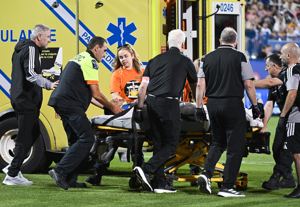 Inter Miami CF's German Berterame is stretchered off the pitch after colliding with CF Montreal's Efrain Morales during second half MLS soccer action in Montreal, on Saturday, July 25, 2026. (Graham Hughes/The Canadian Press via AP)