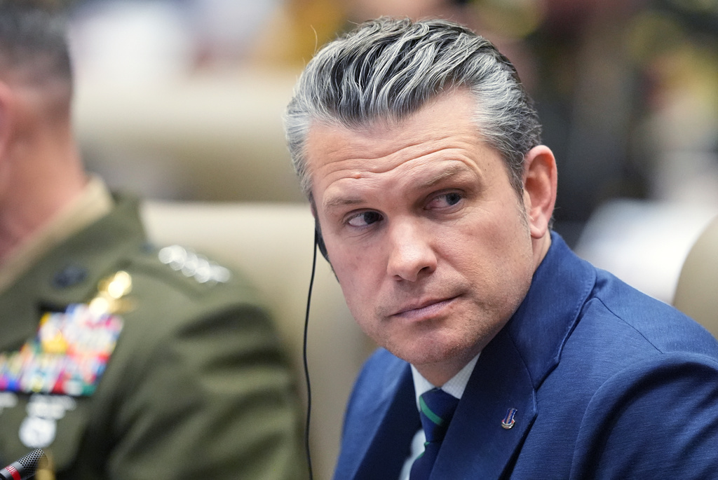Defense Secretary Pete Hegseth listens during the inaugural Americas Counter Cartel Conference at U.S. Southern Command in Doral, Fla., Thursday, March 5, 2026. (AP Photo/Rebecca Blackwell)
