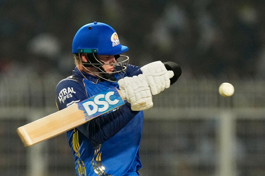 Mumbai Indians' Corbin Bosch plays a shot during the Indian Premier League cricket match between Kolkata Knight Riders and Mumbai Indians, in Kolkata , India, Wednesday, May 20, 2026. (AP Photo/Bikas Das)