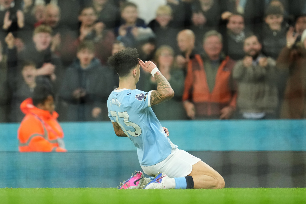 Manchester City's Nico O'Reilly celebrates after scoring during the English Premier League soccer match between Manchetser City nad Newcastle in Manchester, England, Saturday, Feb. 21, 2026. (AP Photo/Jon Super)