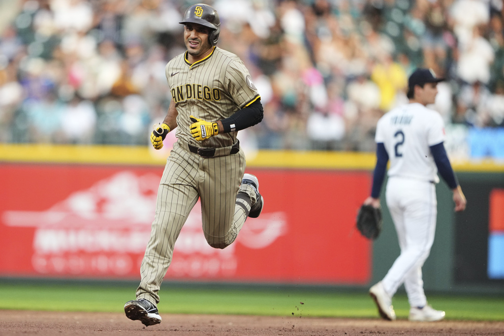 San Diego Padres' Ramon Laureano jogs the bases after hitting a grand slam against the Seattle Mariners during the first inning of a baseball game Tuesday, Aug. 26, 2025, in Seattle. (AP Photo/Lindsey Wasson)
