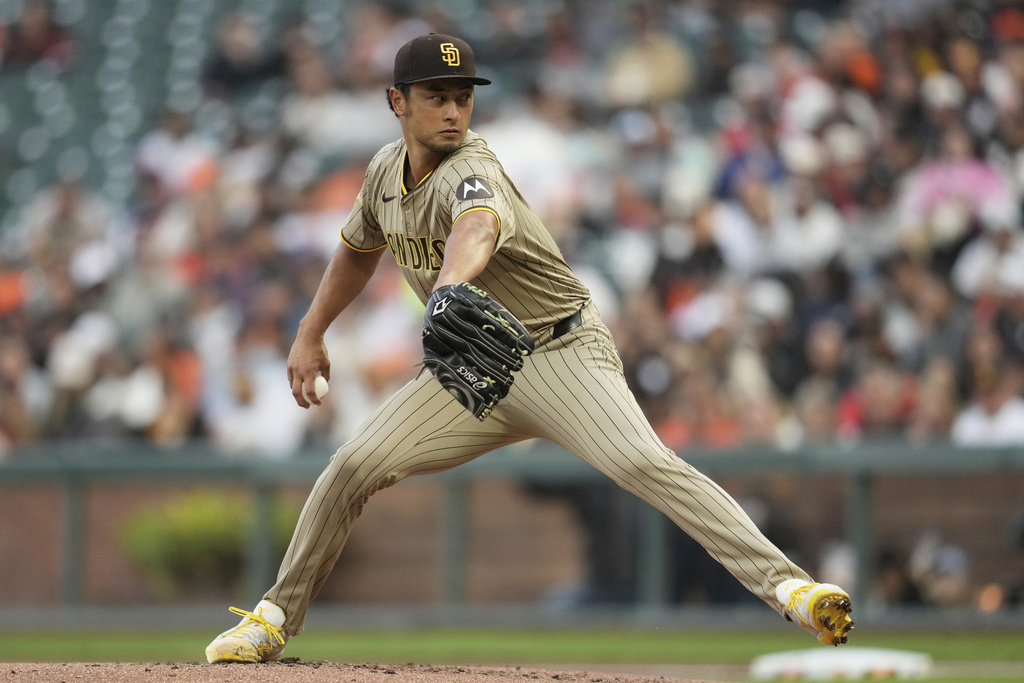 San Diego Padres pitcher Yu Darvish throws against the San Francisco Giants during the first inning of a baseball game in San Francisco, Monday, Aug. 11, 2025. (AP Photo/Jeff Chiu)