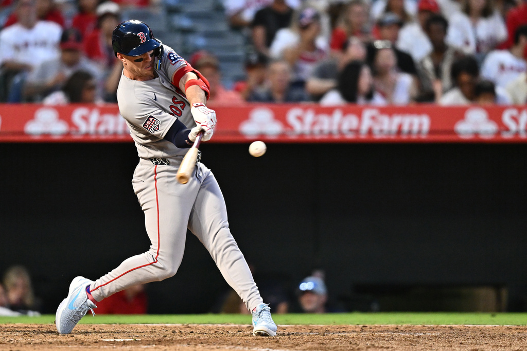 Boston Red Sox's Romy Gonzalez hits a two-run home run during the fifth inning of a baseball game against the Los Angeles Angels, Saturday, July 4, 2026, in Anaheim, Calif. (AP Photo/William Liang)