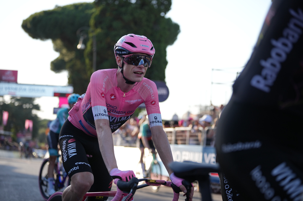 Overall leader Denmark's Jonas Vingegaard arrives at the finish line of the last stage of the Giro d'Italia in Rome Sunday May 31, 2026. (AP Photo/Andrew Medichini)