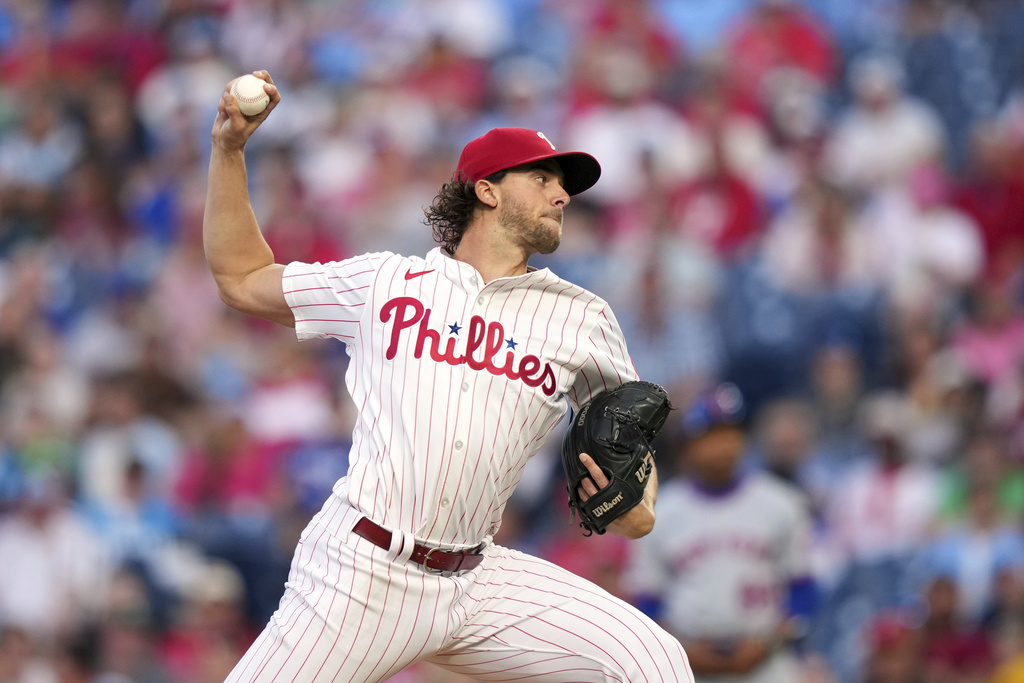 Philadelphia Phillies' Aaron Nola pitches during the first inning of a baseball game against the New York Mets Monday, Sept. 8, 2025, in Philadelphia. (AP Photo/Matt Slocum)