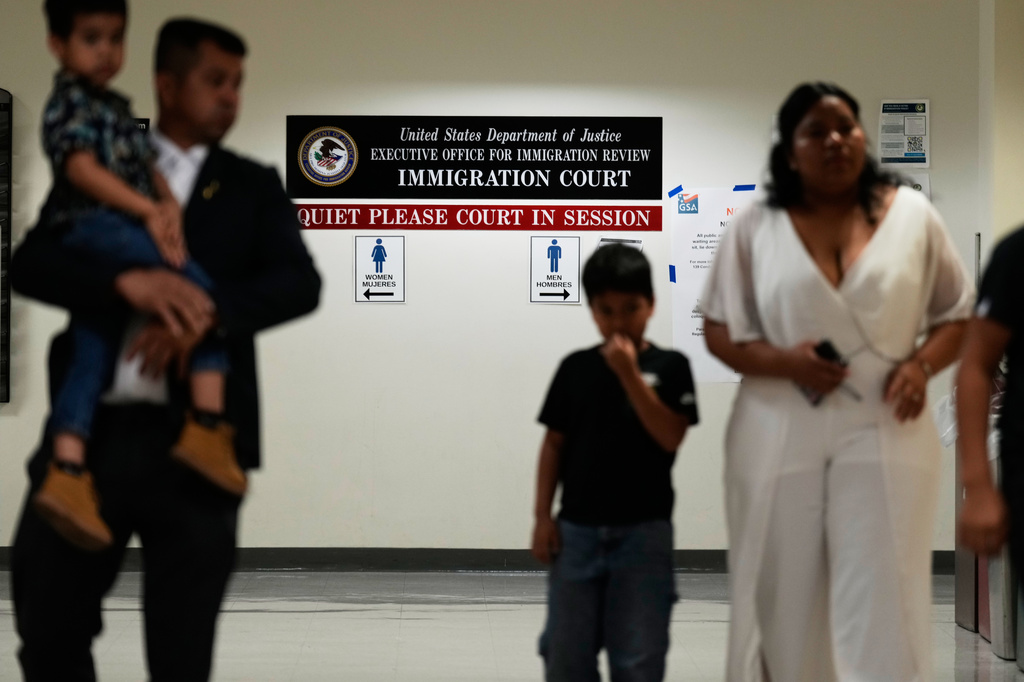 People arrive for immigration court hearings in New York, Monday, July 27, 2026. (AP Photo/Seth Wenig)