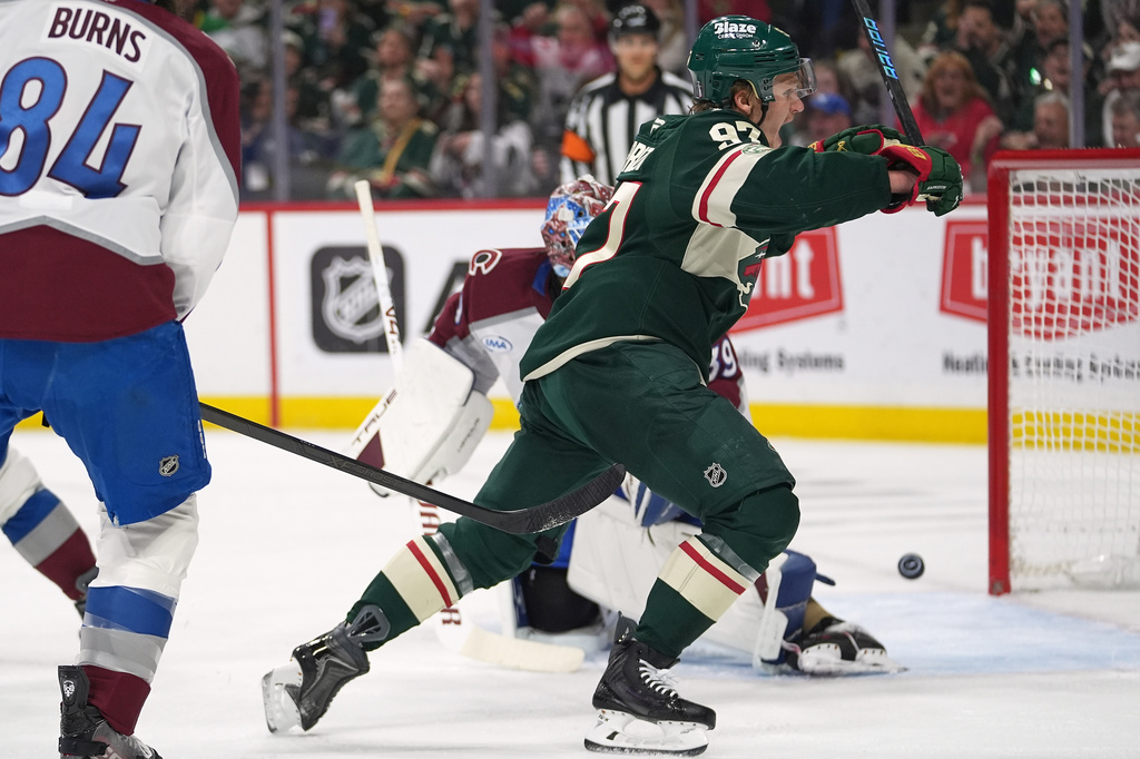 Minnesota Wild left wing Kirill Kaprizov (97) celebrates after a goal by Wild right wing Danila Yurov (not shown) during the first period of Game 4 in a second-round NHL hockey Stanley Cup playoff series against the Colorado Avalanche Monday, May 11, 2026, in St. Paul, Minn. (AP Photo/Abbie Parr)