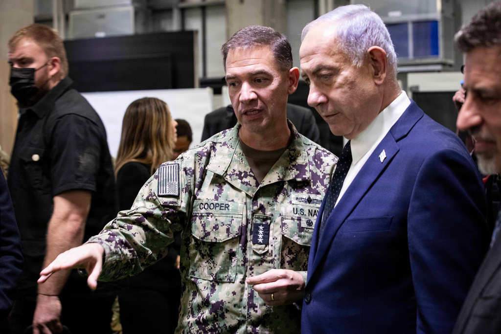 Adm. Brad Cooper, commander of U.S. Central Command, and members of the Israeli Defense Forces host Israeli Prime Minister Benjamin Nentanyahu inside the Civil-Military Coordination Center (CMCC) Oct. 29, 2025, in Israel. (Staff Sgt. Michael Ito/U.S. Army via AP))