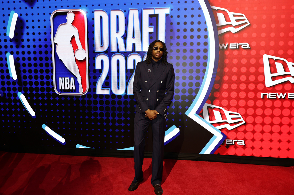 Isaiah Evans arrives for the first round of the NBA basketball draft Tuesday, June 23, 2026, in New York. (AP Photo/Adam Hunger)