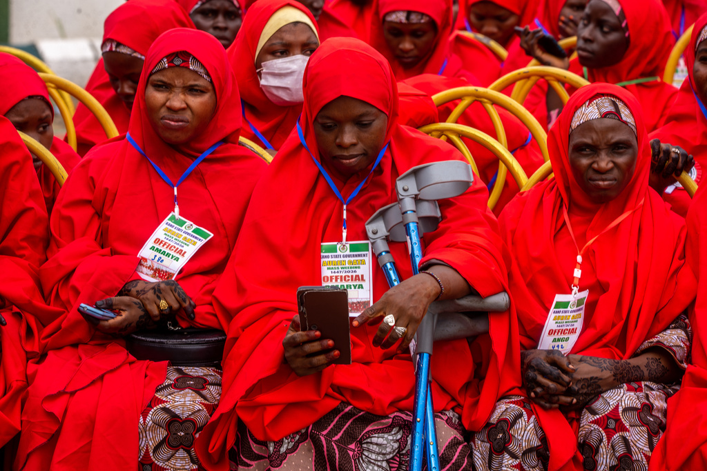 Nigerian brides attend a mass wedding ceremony in Kano, Nigeria, Saturday, Aug. 8, 2026. (AP Photo/Sani Maikatanga)