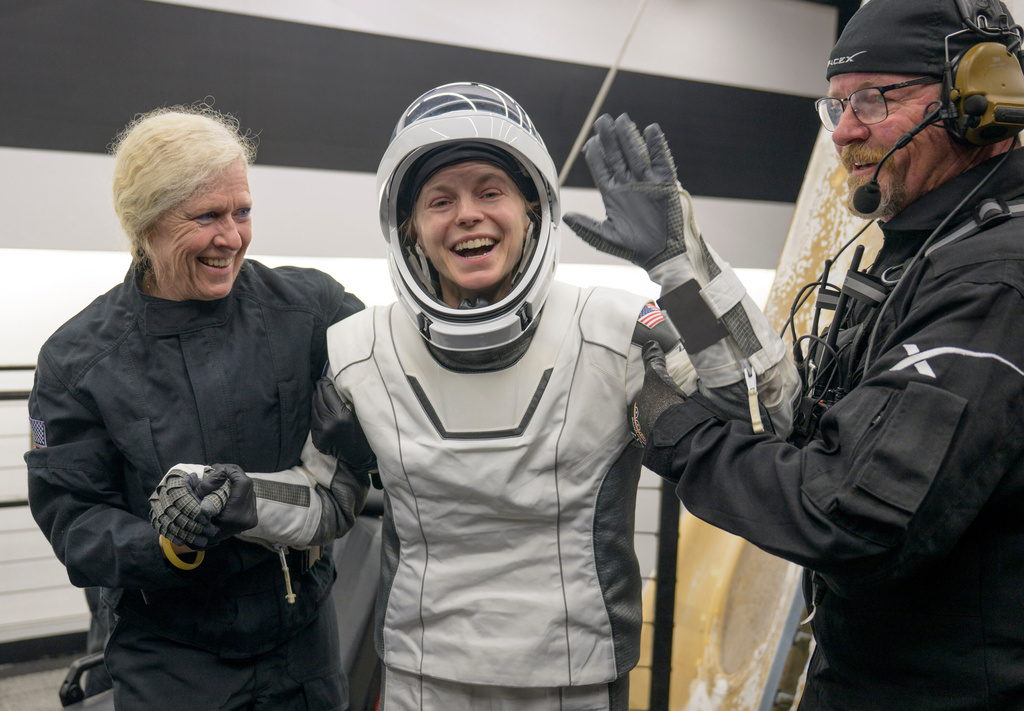 NASA astronaut Zena Cardman is helped out of the SpaceX Crew-11 capsule after they re-entered the earth in a middle-of-the-night splashdown near San Diego, Calif., Thursday, Jan. 15, 2026. (NASA via AP)