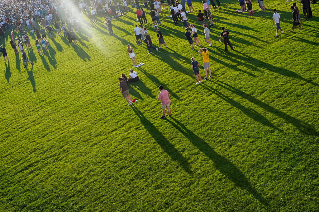 People arrive before President Donald Trump speaks at the opening of the Great American State Fair on the National Mall, Wednesday, June 24, 2026, in Washington. (AP Photo/Jen Golbeck)