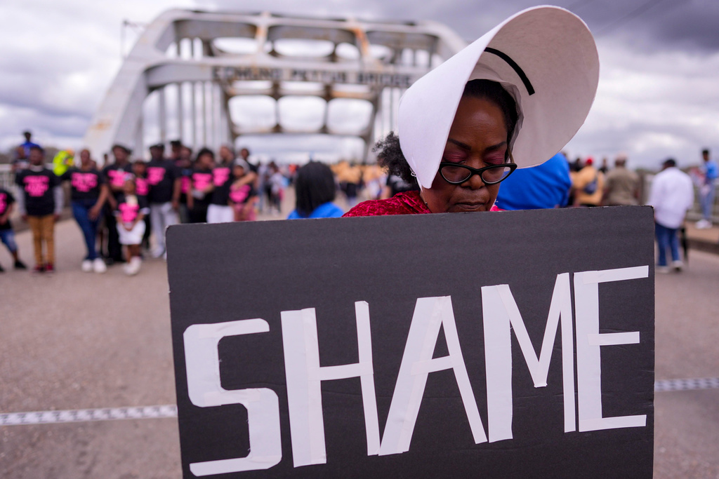 People march on the 61st Bloody Sunday Anniversary, Sunday, March 8, 2026, in Selma, Ala. (AP Photo/Mike Stewart)