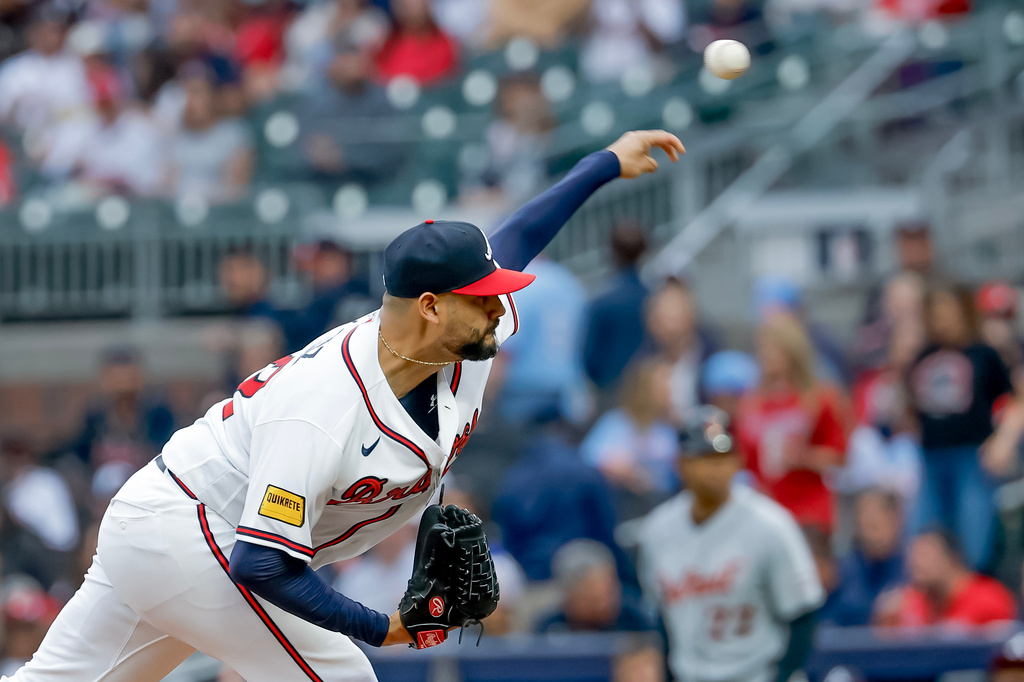 Atlanta Braves pitcher Martin Perez (33) delivers to a Detroit Tigers batter during the first inning of a baseball game against the Detroit Tigers, Tuesday, April 28, 2026, in Atlanta. (AP Photo/Erik S. Lesser)