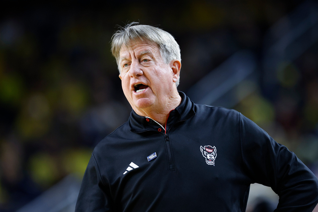 North Carolina State coach Wes Moore gives instructions against Michigan during the first half in the second round of the NCAA college basketball tournament, Sunday, March 22, 2026, in Ann Arbor, Mich. (AP Photo/Al Goldis)