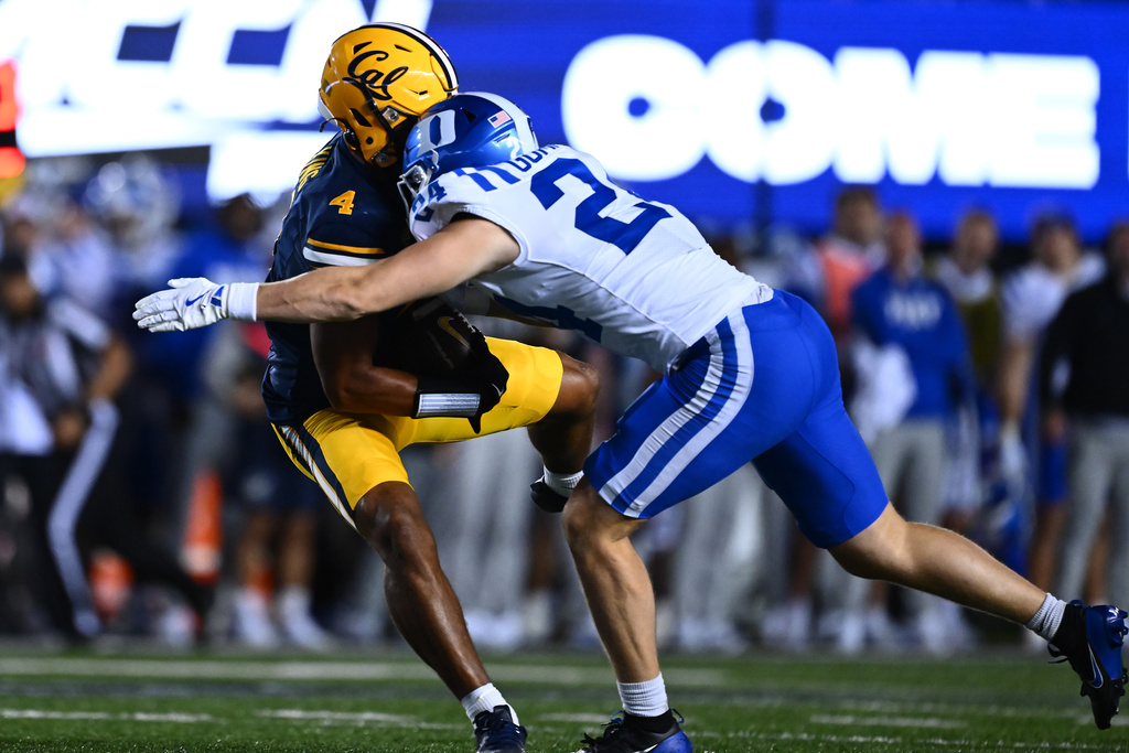 Duke Blue Devils linebacker Bradley Gompers (24) is called for targeting against California Golden Bears wide receiver Jordan King (4) after making a catch in the first half of their game at Memorial Stadium in Berkeley, Calif., on Saturday, Oct. 4, 2025. (Jose Carlos Fajardo/Bay Area News Group via AP)