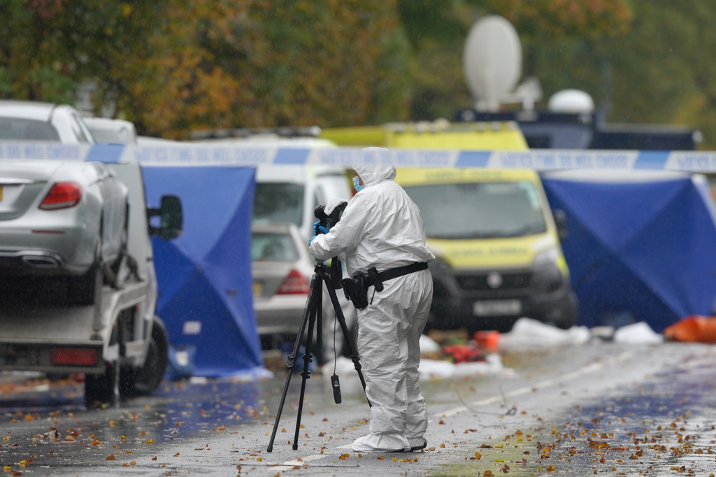 A forensic officer works at the scene of a stabbing incident at Heaton Park Hebrew Congregation synagogue, in Crumpsall, Manchester, England, Friday, Oct. 3, 2025,the attack took place Thursday. (AP Photo/Ian Hodgson)