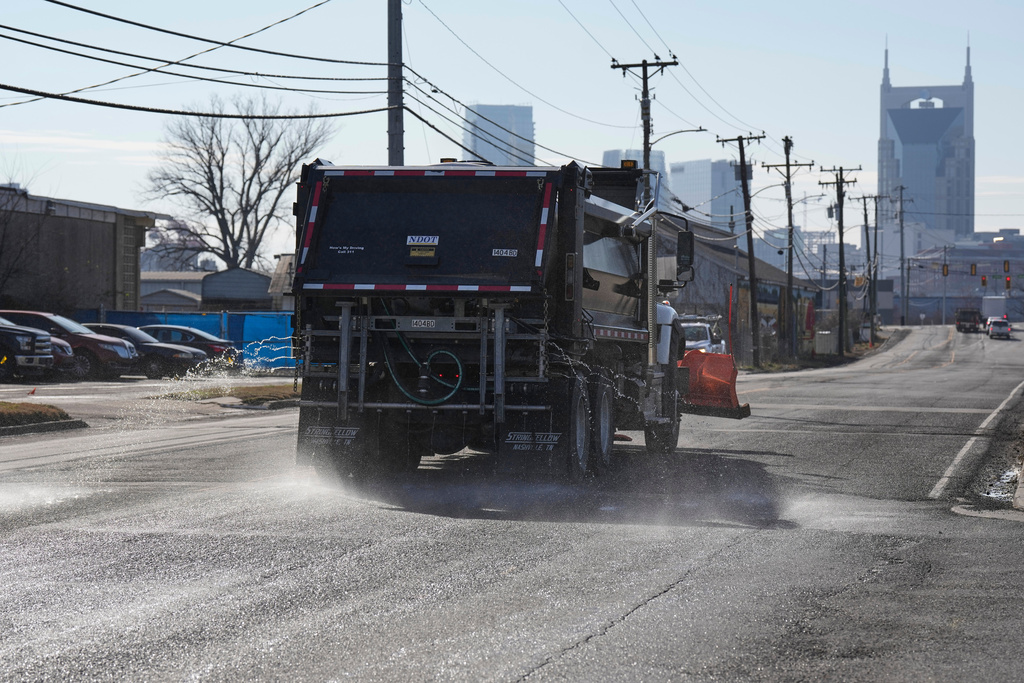A Nashville Department of Transportation truck applies salt brine to a roadway Thursday, Jan. 22, 2026, in Nashville, Tenn. ahead of a winter storm expected to hit the state over the weekend. (AP Photo/George Walker IV)