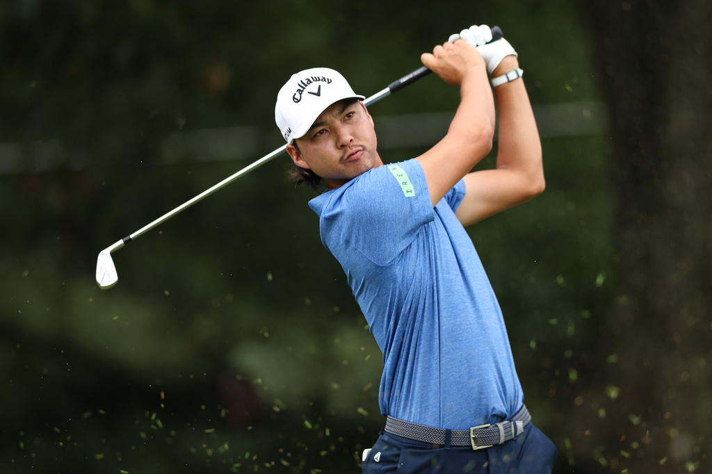 Min Woo Lee plays his tee shot on the third hole during the first round of the Tour Championship golf tournament, Thursday, Aug. 27, 2026, in Atlanta. (AP Photo/Colin Hubbard) CORRECTION: "Min Woo Lee" is correct not Si Woo Kim"