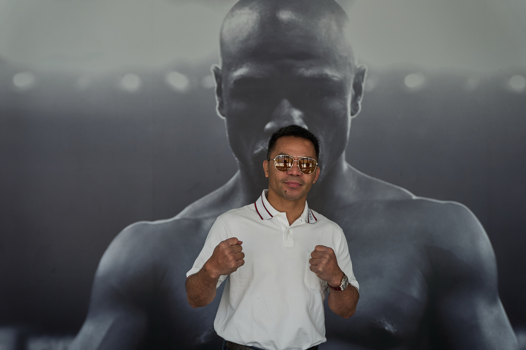 Boxer Manny Pacquiao poses fora pictures while touringfff "Pacquiao Prime Boxing," his newly acquired gym in Hollywood, on Monday, April 6, 2026. The facility was formerly owned by rival Floyd Mayweather Jr. (AP Photo/Damian Dovarganes)