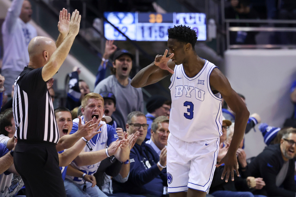 BYU forward AJ Dybantsa (3) reacts after making a three point basket against TCU during the second half of an NCAA basketball game, Wednesday, Jan. 14, 2026, in Provo, Utah. (AP Photo/Rob Gray)