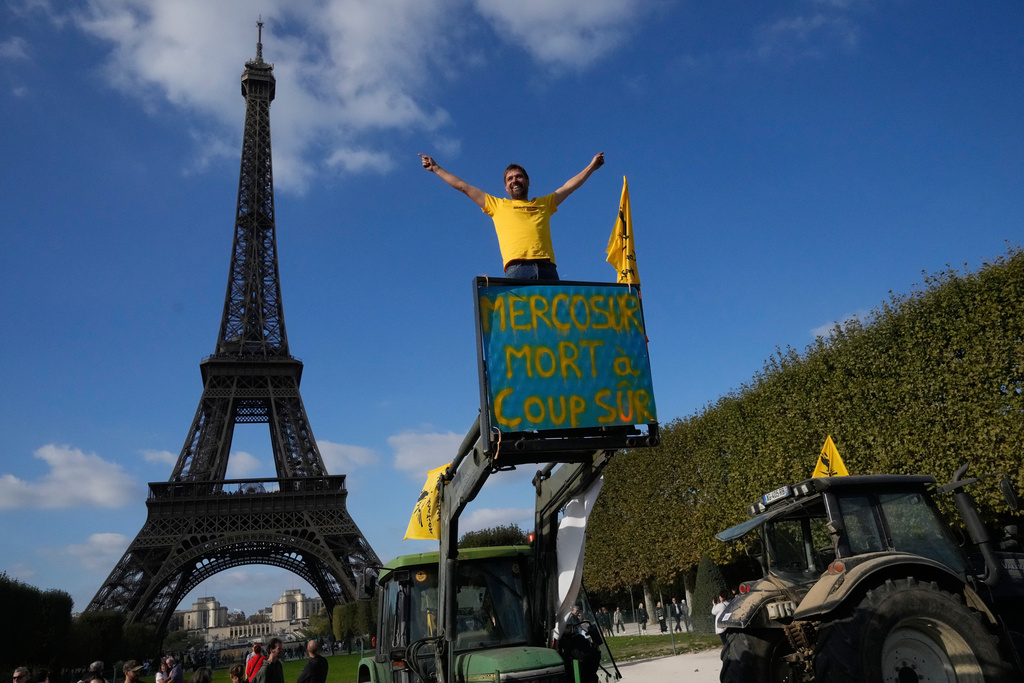 FILE - French farmers protest against the Mercosur trade alliance with South America countries, on Oct. 14, 2025 near the Eiffel Tower in Paris. (AP Photo/Michel Euler, File)