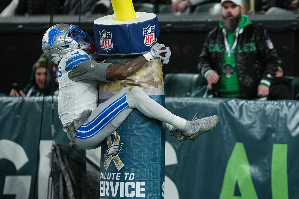 Detroit Lions wide receiver Jameson Williams celebrates scoring a touchdown during the first half of an NFL football game against the Philadelphia Eagles on Sunday, Nov. 16, 2025, in Philadelphia. (AP Photo/Matt Rourke)