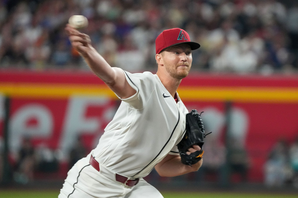 Arizona Diamondbacks pitcher Michael Soroka works against the Detroit Tigers during the first inning of an opening-day baseball game Monday, March 30, 2026, in Phoenix. (AP Photo/Darryl Webb)