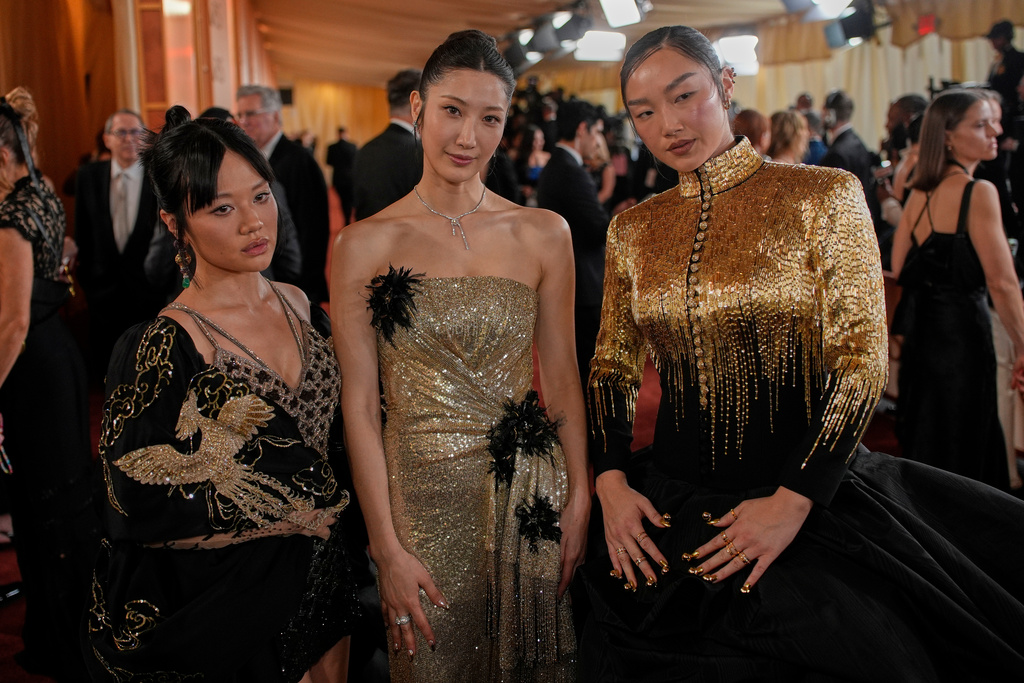 Rei Ami,from left, Ejae, Audrey Nuna arrive at the Oscars on Sunday, March 15, 2026, at the Dolby Theatre in Los Angeles. (AP Photo/John Locher)
