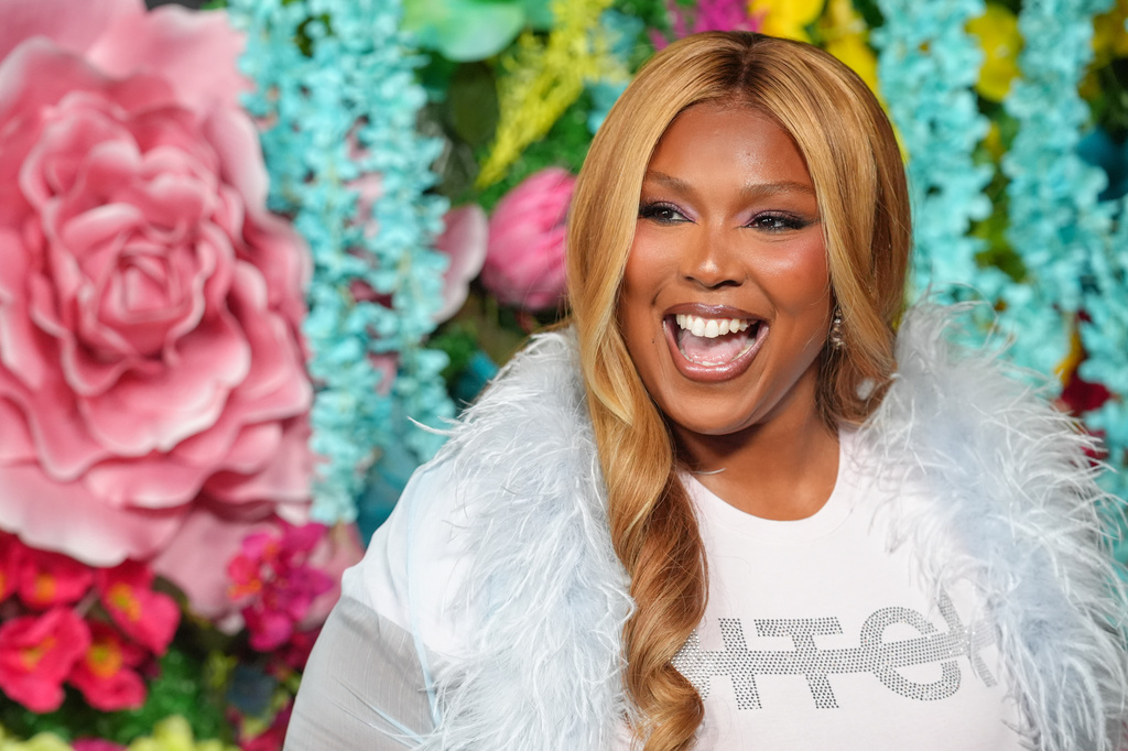 Lizzo arrives at the premiere of "I Love Boosters" on Wednesday, May 13, 2026, at the DGA Theater Complex in Los Angeles. (AP Photo/Chris Pizzello)