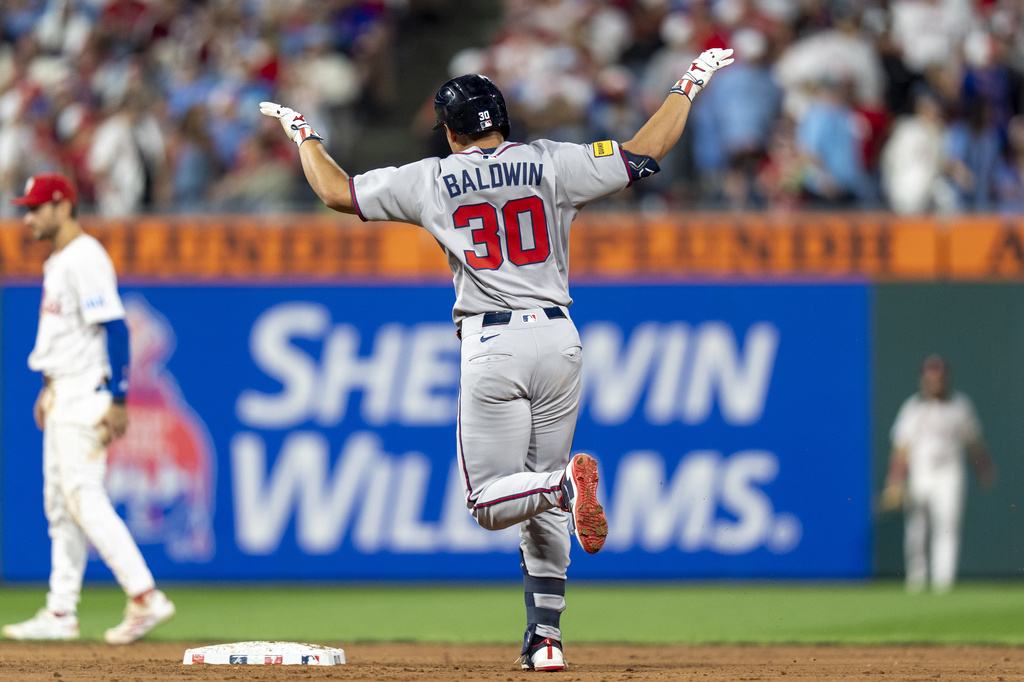 Atlanta Braves' Drake Baldwin reacts after his two-run home run during the ninth inning of a baseball game against the Philadelphia Phillies, Sunday, Aug. 31, 2025, in Philadelphia. (AP Photo/Chris Szagola)