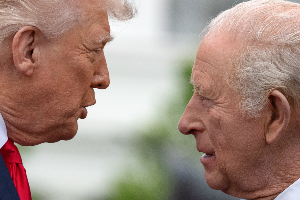 Britain's King Charles III, right, listens as President Donald Trump speaks during a State Visit arrival ceremony on the South Lawn of the White House, Tuesday, April 28, 2026, in Washington. (AP Photo/Mark Schiefelbein)