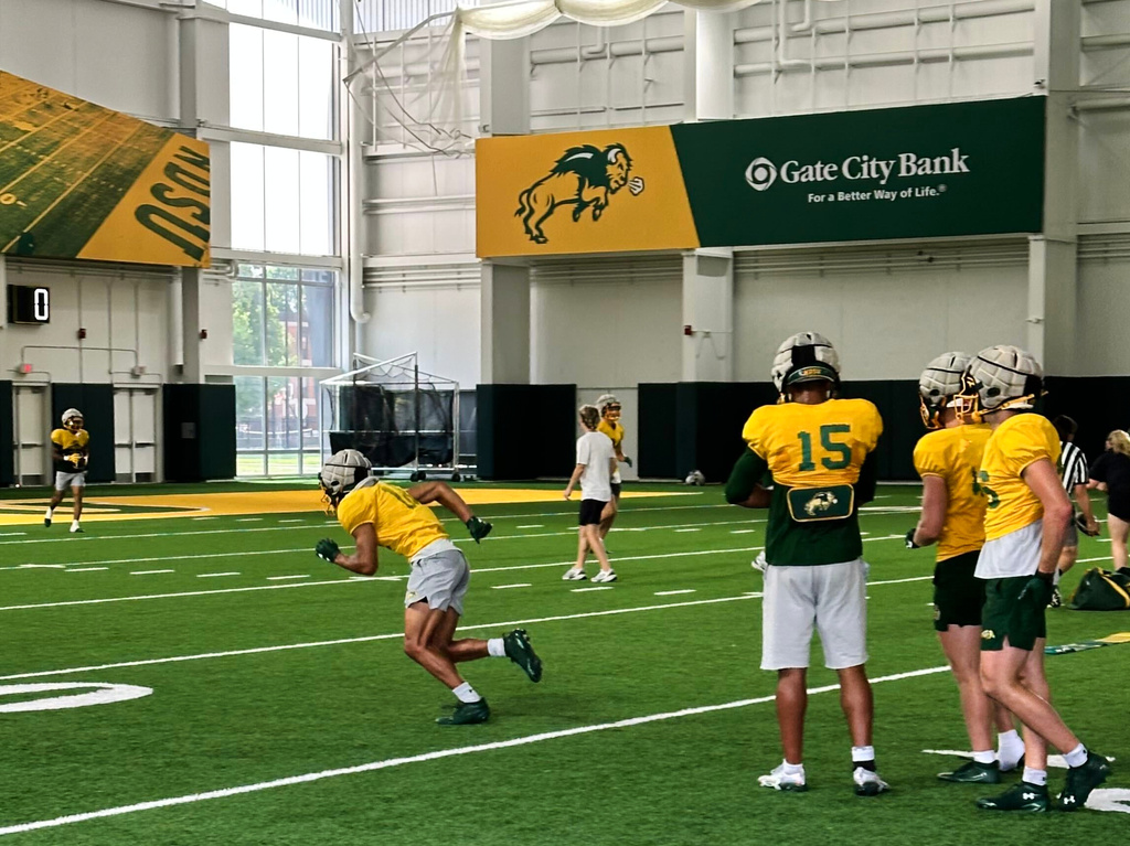 North Dakota State wide receiver Jackson Williams runs a route during NCAA college football practice in Fargo, N.D. Monday, Aug. 17, 2026, at the Fargodome in Fargo, N.D. (AP Photo/Dave Campbell)