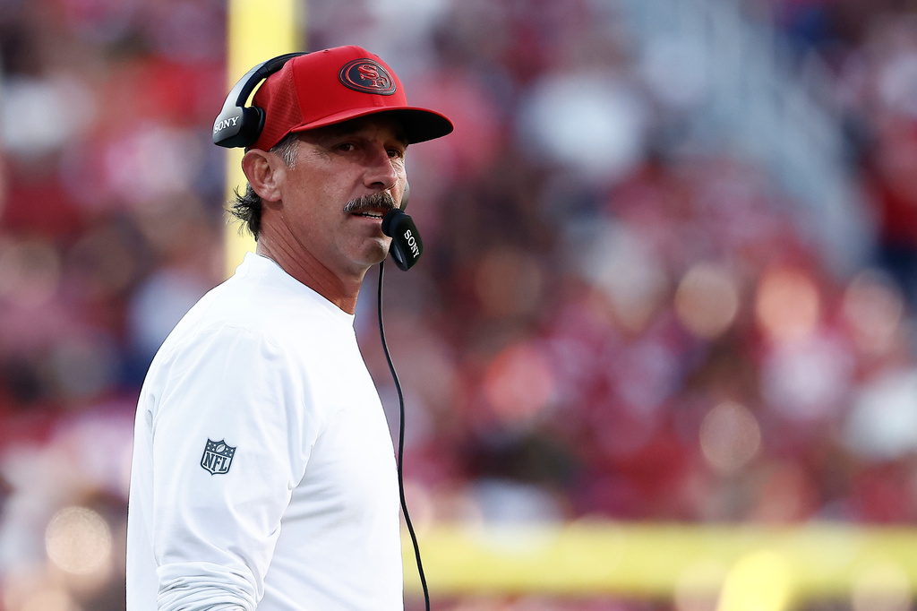San Francisco 49ers head coach Kyle Shanahan watches from the sideline during the first half of a preseason NFL football game against the Tennessee Titans, Thursday, Aug. 13, 2026, in Santa Clara, Calif. (AP Photo/Kelley L. Cox)