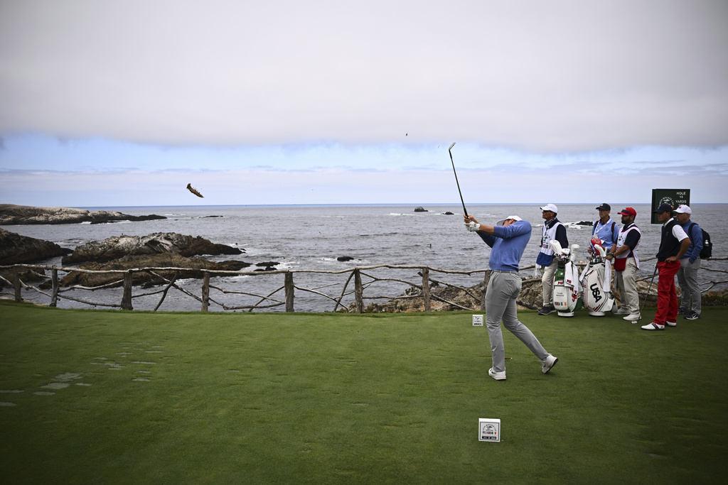 The Great Britain and Ireland team's Tyler Weaver hits from the 15th tee during Walker Cup golf matches against the USA team at Cypress Point Club on Saturday, Sept. 6, 2025, in Pebble Beach, Calif. (AP Photo/Thien-An Truong)