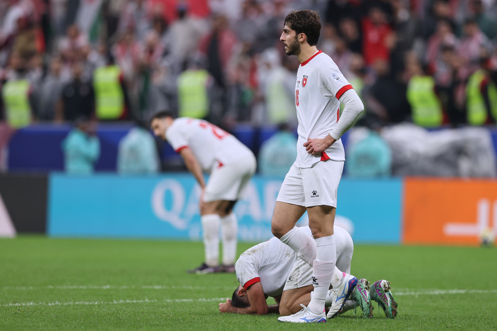 Jordan's are dejected at the end of the FIFA Arab Cup final soccer match between Jordan and Morocco in Lusail, Qatar, Thursday, Dec. 18, 2025. (AP Photo/Hussein Sayed)