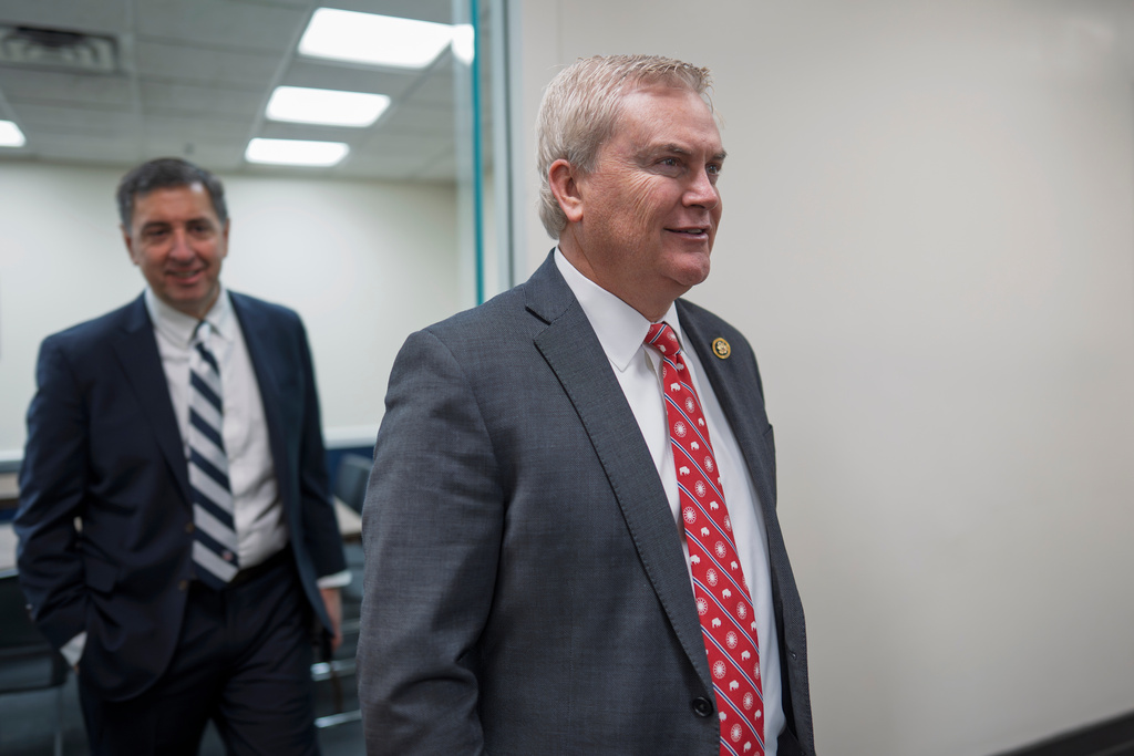 House Oversight Committee Chairman James Comer, R-Ky., arrives for an early closed-door Republican Conference meeting on how to end the partial government shutdown after advancing criminal contempt of Congress charges against former President Bill Clinton and former Secretary of State Hillary Clinton for defying a congressional subpoena to testify to his panel in the Jeffrey Epstein investigation, at the Capitol in Washington, Tuesday, Feb. 3, 2026. (AP Photo/J. Scott Applewhite)